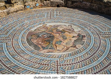 Mosaic image of the duel between Theseus and the Minotaur. House of Theseus. Paphos Archaeological Park. Cyprus. Inscription: Theseus, Minotaur, Labyrinth, Ariadne, Crete.