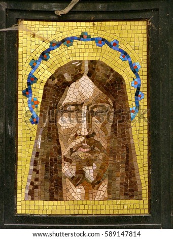 Mosaic of Jesus Christ on Tombstone in Olšany Cemetery in Prague, Czech Republic