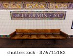 mosaic and old bench at Jefferson Street Subway Station in Brooklyn, New York City