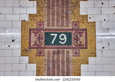 Mosaic on walls of 79th Street subway underground in New York City
