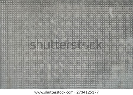 mosaic pattern on a dirty window glass                                 