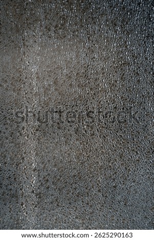mosaic pattern on window glass                               