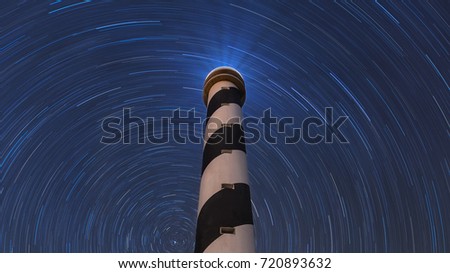 Moscater lighthouse at night with star trails  , Portinatx , Ibiza .