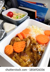 MOSCOW - 06, 2019: food on the plane on an Aeroflot flight pork with rice during flight, Aeroflot is largest airline in Russia
