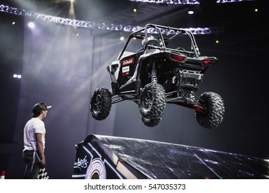 MOSCOW - 14 MARCH,2015: Extreme Sport Competition Show Proryv.Baggy Car Racer Race For The Prize.Indoor Motor Sport Contest.Car Jump From Ramp