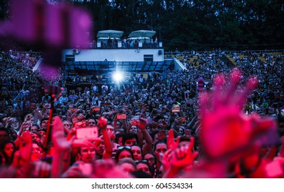 MOSCOW - 2 JUNE,2016: Big Live Outdoor Summer Concert Of Popular Russian Rapper L'One.Music Festival Background.Huge Concert Crowd Wave Hands.View From Stage On Dance Floor