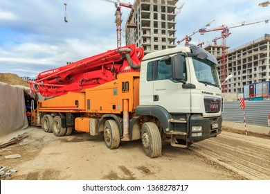 Moscow – 2019: Concrete pump is machine used for transferring liquid concrete by pumping. pump folded for transport. Boom concrete pump. Putzmeister truck-mounted concrete pump M47-5. PUMI