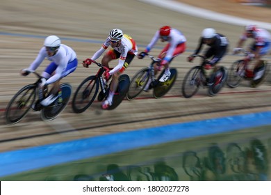 MOSCOW - 2019, June 01: Cycling Track Race At UCI Grand Prix Moscow  On June 01-03, 2019 In Krylatskoe Velodrome, Moscow, Russia. Group Of Cyclists Riding Fast During Track Race Panning Effect Taken