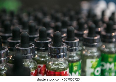 MOSCOW - 9 DECEMBER,2016: Vape Expo Shopt.Electronic Cigarette Filling Liquid Store.E-liquid,e-juice On Sale In Plastic Bottle.Eliquid,ejuice For Vaping Device.Fill Vaporizer,vape Safely.No Nicotine