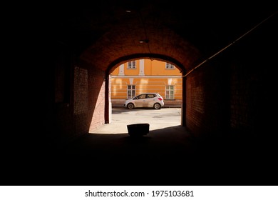 Moscow - April 11, 2021. Kia Venga Hatch Back Car Parked In The Historic Center Of Moscow, View From An Arch Of An Old Building. Sunny Daylight View.