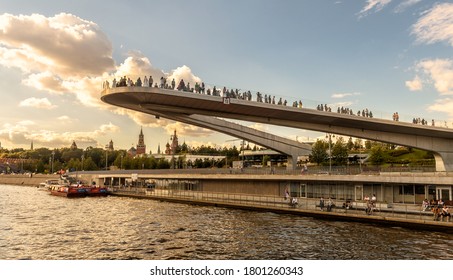 Moscow - Aug 21, 2020: Floating bridge in Zaryadye Park near Moscow Kremlin, Russia. Zaryadye is one of main tourist attractions of Moscow. Amazing view of hovering construction above Moskva River.
