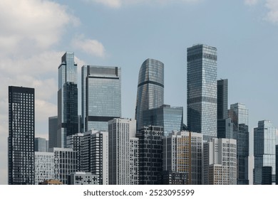 Moscow City Business Center . A complex of modern high-rise residential buildings against the background of the business center of the metropolis .  - Powered by Shutterstock