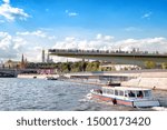 moscow city russia kremlin cityscape with people on bridge over moskva river waters and pleasure boat full of tourists on sightseeing tour landscape street view of town center historical skyline