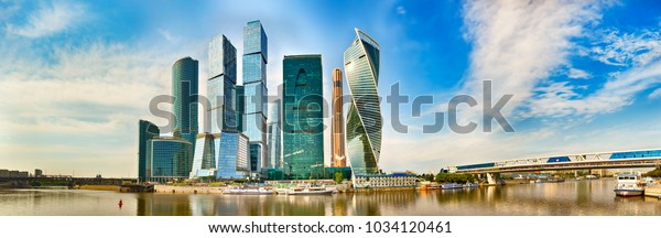 Moscow City skyline . Moscow International\
Business Centre at day time with Moskva river in foreground . High\
resolution Panorama