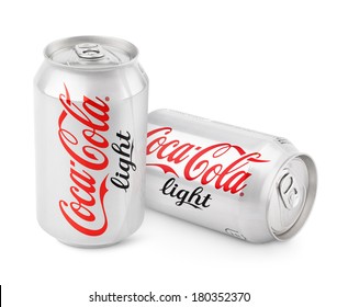 MOSCOW - DECEMBER 13, 2014: Aluminum cans of Coca-Cola Light produced by the Coca-Cola Company isolated on white background with clipping path