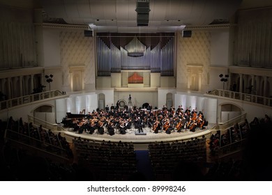 MOSCOW - FEB 26: Audience Looks At Symphony Orchestra Of Moscow State Conservatory Named After P. Tchaikovsky In Tchaikovsky Concert Hall, Feb 26, 2011 In Moscow, Russia. Conductor Is Anatoly Levin.