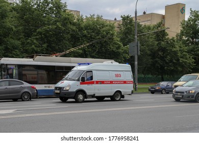 Moscow - July 15, 2020: Ambulance Car Is Driving Down The Street Near The Hospital