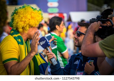 MOSCOW, July 2, 2018. Brazilian fan giving interviews on the central Fan Zone. The period of the International FIFA World Cup 2018 in Russia.