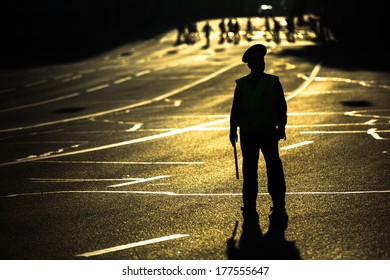 MOSCOW - JUNE 13, 2013: Silhouette of road policemen regulating traffic jam on the city center. Moscow Mayor Sobyanin reconstructs suburban railways, to solve problem of traffic jams in 2016.
