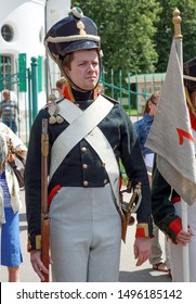 Moscow - June 2015: Portrait of a man in the form of a soldier during the war with Napoleon. Reconstruction of suits at the beginning of the 19th century.