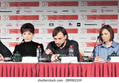 MOSCOW - JUNE 21, 2015: Actress Chulpan Khamatova (first At Left) And Actor Eugeny Tsyganov At Press-conference Of Moscow International Film Festival.