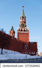 Moscow Kremlin Spasskaya Tower In Winter With Snow On The Foreground Lit By The Evening Sun