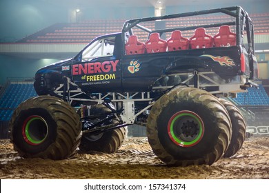 MOSCOW - MAR 23: Big Car On The Sand And Empty Stands On Show Monster Mania In Olimpiyskiy In March 23, 2013 In Moscow, Russia.