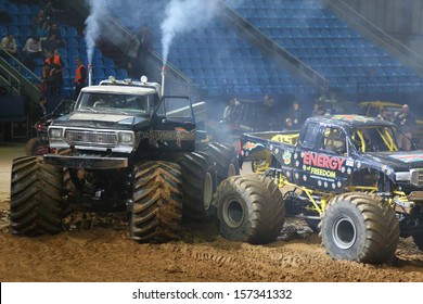 MOSCOW - MAR 23: Two Big Car On Show Monster Mania In Olimpiyskiy In March 23, 2013 In Moscow, Russia.