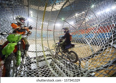 MOSCOW - MAR 23: Two Stuntmen  Show A Thumbs Up Inside A Mesh Ball On Show Monster Mania In Olimpiyskiy In March 23, 2013 In Moscow, Russia.