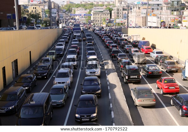MOSCOW -\
MAY 5: Cars stands in traffic jam on the city center, May 5, 2011,\
Moscow Russia. In Moscow continues rapid growth cars park, now more\
than 380 cars per 1,000\
inhabitants.