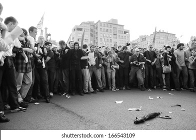 MOSCOW - MAY 6: Russian protesters in standoff with police during "March of the Millions" which turned into the biggest clash with police in Russia's contemporary history, on May 6, 2012 in Moscow.