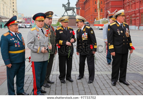 MOSCOW - MAY 8: Unidentified Veterans\
near monument to military commander Georgy Zhukov on Manege Square\
at Victory Day, on May 8, 2011, Moscow,\
Russia.