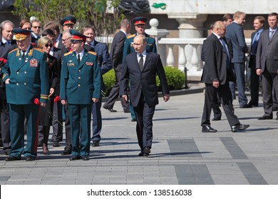 MOSCOW - MAY 8: Vladimir Putin At The Ceremony Of Laying Wreaths To The Tomb Of The Unknown Soldie. Festive Events Dedicated To The 67th Anniversary Of Victory Day  On MAY 8, 2013 In Moscow, Russia