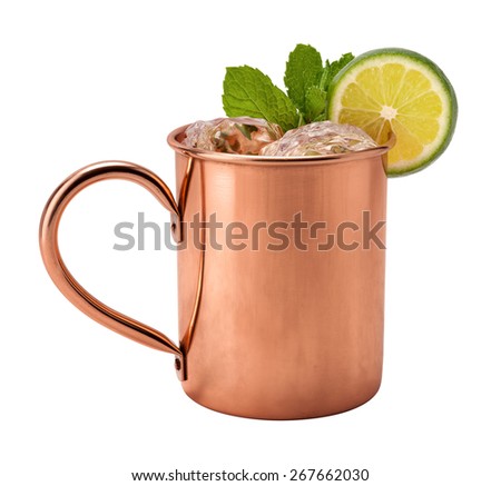 Moscow Mule in a Copper Mug. This is a Vodka drink served with mint, and a garnished with a slice of lime, The image is a cut out, isolated on a white background, and includes a clipping path. 