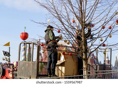 MOSCOW - NOVEMBER 13, 2019: Workers Fixes Christmas Decoration On The Red Square In Moscow.