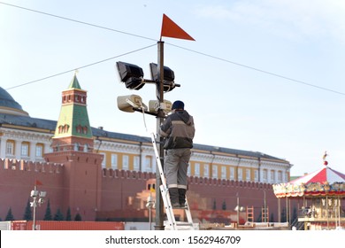 MOSCOW - NOVEMBER 13, 2019: Workers Fixes Christmas Decoration On The Red Square In Moscow.