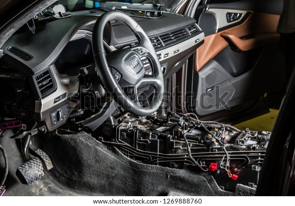 Moscow.\
November 2018. Audi car repair service center. Dismantled car\
interior. Check car wiring. Removed chairs, floor trim. leather\
interior premium crossover. Gearbox\
repair