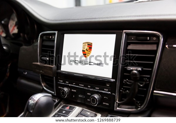 Moscow. November 2018. Leather\
interior of premium luxury car. LSD Monitor of multimedia system\
PCM 3.1 with the brand logo. carbon inserts, aluminum panels,\
gearbox