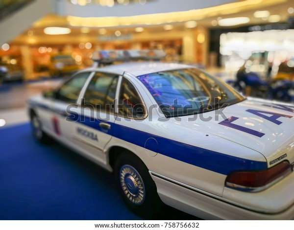 MOSCOW - NOVEMBER 9, 2017: Soviet police Ford\
Crown Victoria car posing on blue cover in blurred vignette on\
November 9, 2017 in\
Moscow.\
