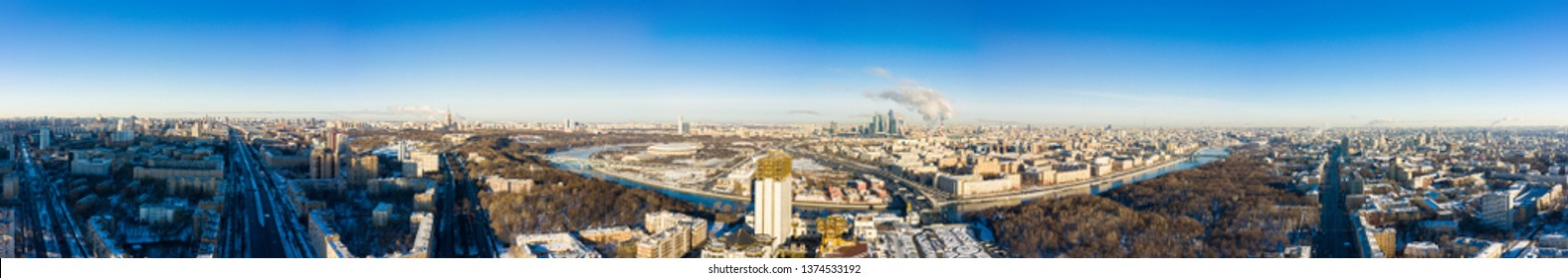 Moscow Panorama And Leninsky Avenue With Monument To Yuri Gagarin On A Winter Day. Top View Of The Avenue And Car Traffic.