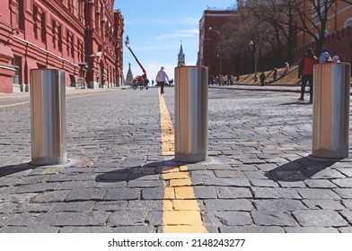 Moscow: Poles of Traffic blockers. Enter to Red Square via Kremlin passage (Kremlevsky proezd). Protection against the passage of vehicles. Steel automatic traffic blockers. - Shutterstock ID 2148243277