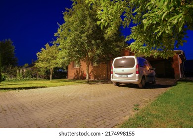 Moscow Region. Russia. July 2, 2022. Minivan Opel Combo Life In The Courtyard Of A Country House On A Summer Night.