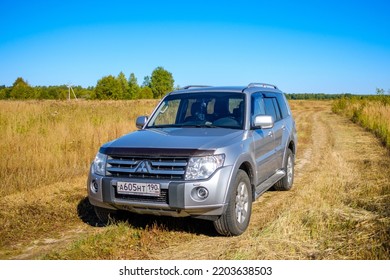 Moscow Region. Russia. September 15, 2022. Mitsubishi Pajero 4 Car On A Country Road In A Field On A Sunny Autumn Day. A Trip To Nature On An All-terrain Vehicle.