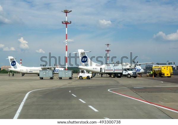 Moscow\
region, Vnukovo, Russia - July 02, 2016: Twin-engine turboprop\
short-haul regional airliner ATR-72 VQ-BLC/VQ-BLJ UTair standing at\
Vnukovo international airport on ground\
handling.