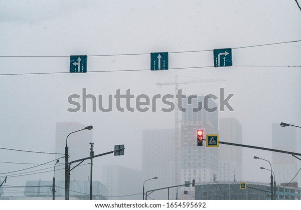 Moscow road signs in snowy\
weather