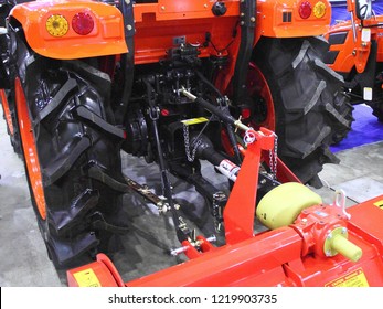 Moscow / Russia – 03 08 2018: Drive For Mounted Units - PTO Shaft And Transfer Case On New Orange Mini Tractor Kioti NX 4520 NST At Russian Motor Boat And Yacht Exhibition Moscow Boat Show MBS 2018