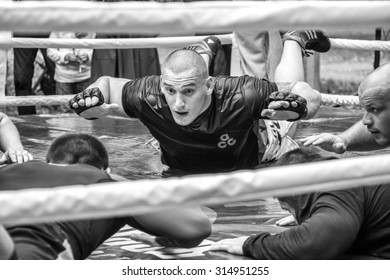 MOSCOW, RUSSIA - 06 SEPTEMBER, 2015: Moscow City Day, sports performance, fight, boxing. Dmitrii Sosnovskii, who win Alexander Emelianenko, MMA fighter master class.