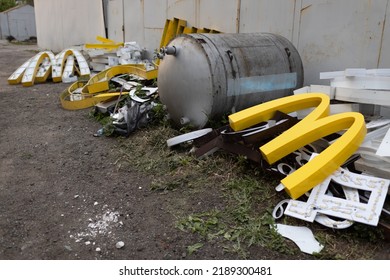 Moscow, Russia - 06.21.2022: McDonalds Logo Letter Character M On Dirty Rubbish Heap Dump Trash Litter Garbage. Fast Food And Sanctions Concept. Environment Issues