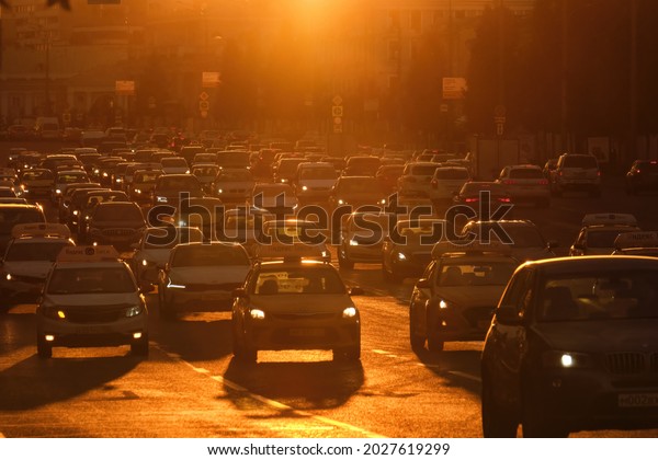 Moscow, Russia - 07.23.2021: Traffic flow in the\
city in beautiful sunset\
time