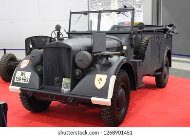 Moscow / Russia – 08 31 2016: Restored gray old German military car of world war II at exhibition Moscow International Automobile Salon MMAS 2016 in Crocus Expo, motor show